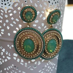 Blue and rhinestone oval dangle earrings